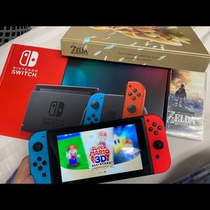 Nintendo Switch v2 2 games + guide